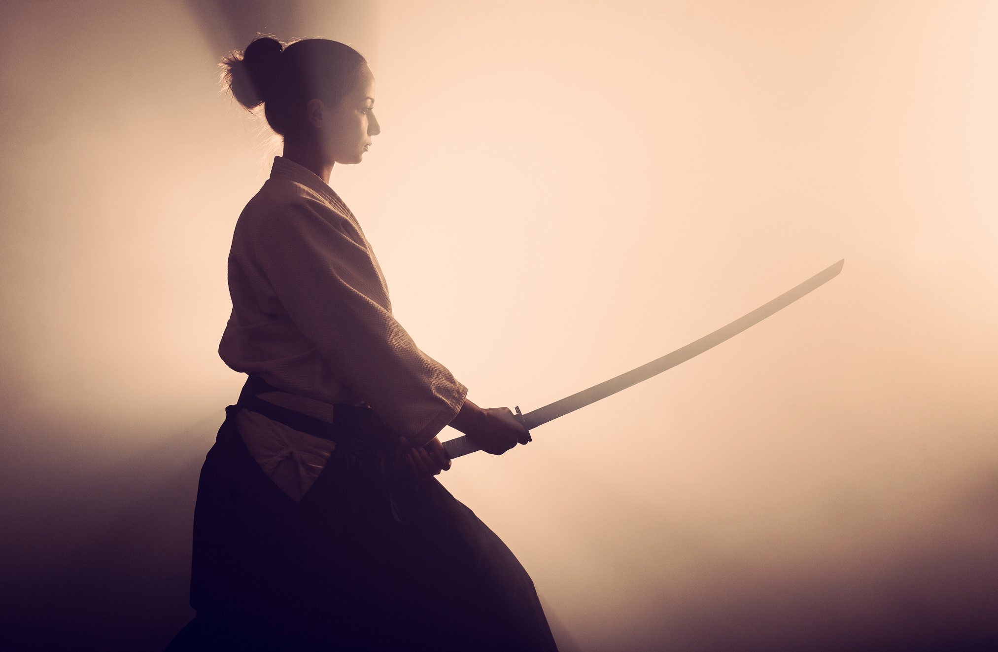 Aikido woman with samurai sword